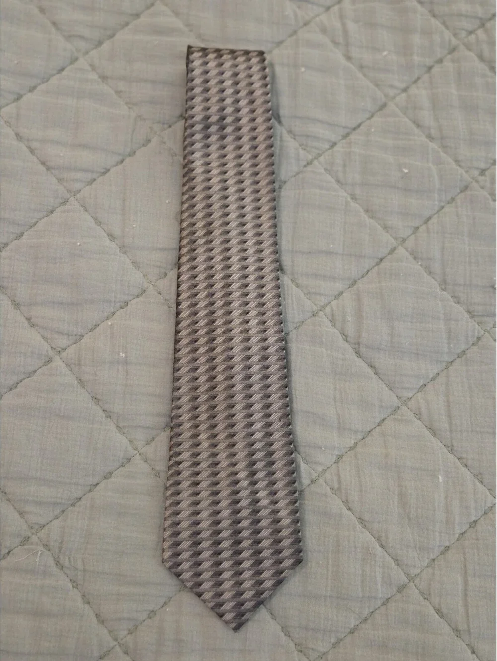 DKNY Men's Tie with distinctive geometric pattern in shades of Gray and Black.